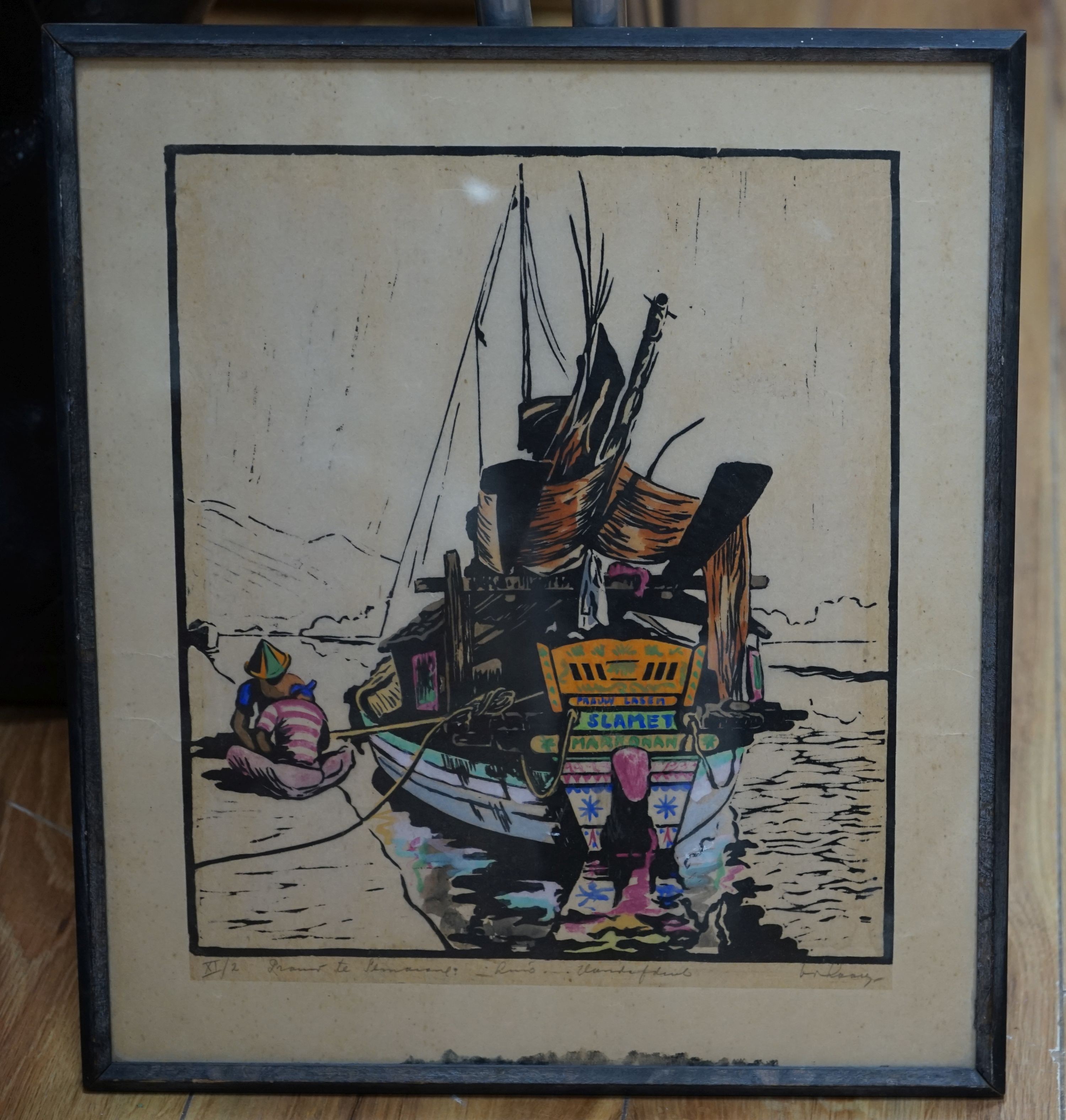 A coloured woodcut of a Bavarian fishing boat, signed in pencil and numbered XI/2, 36 x 31cm, a small Dutch School sepia watercolour, fisherman on a canal, indistinctly signed and a folder of other watercolours